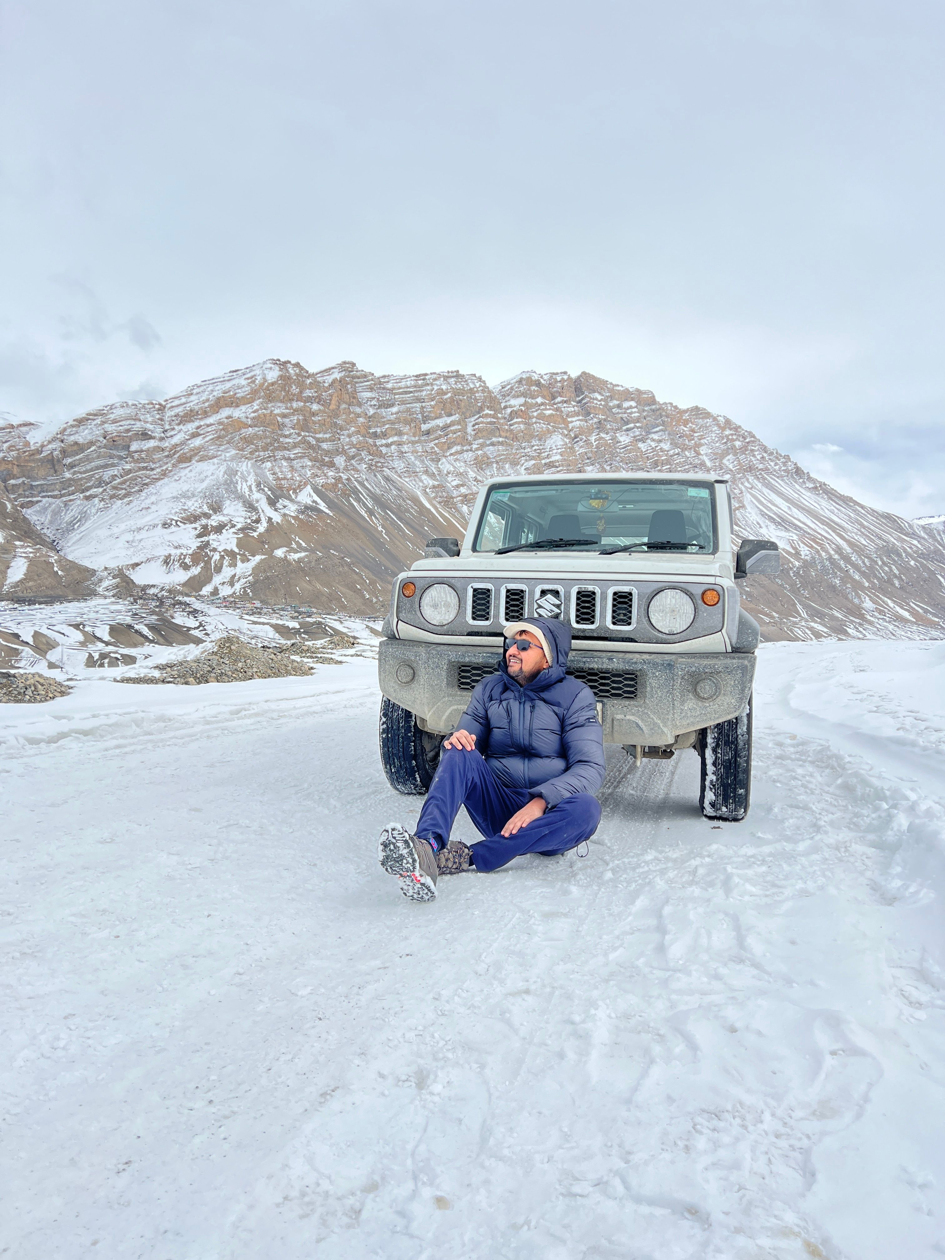 A high-altitude mountain road with a vehicle